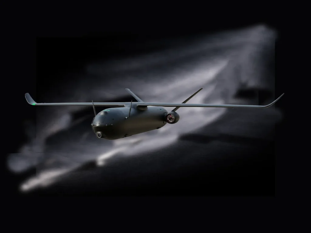 SkyShark autonomous drone with long endurance wings flying through low-light atmospheric conditions