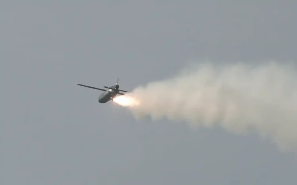 TigerShark one-way effector drone in flight with rocket propulsion demonstrating precision strike capability in contested airspace